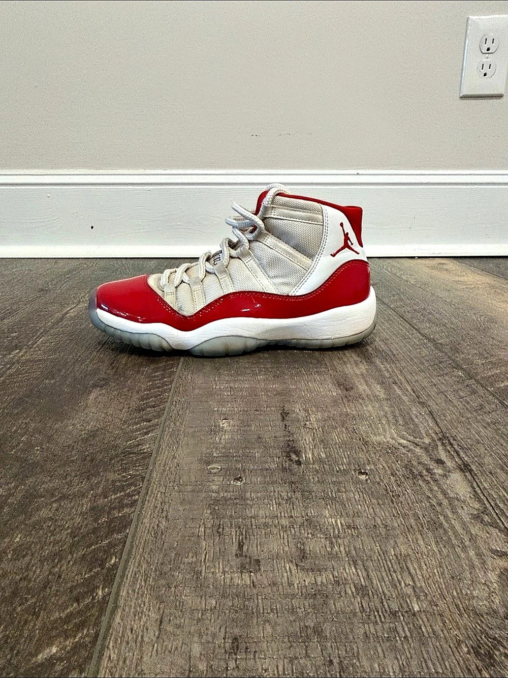 Jordan Air Jordan 11 Retro "Cherry" High Top Sneakers in Red & White